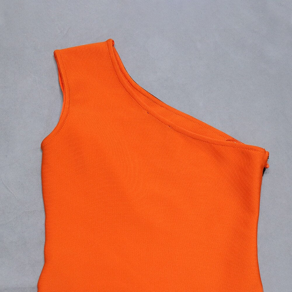 Vestido corto naranja asimétrico - ICON BOUTIQUE WOMAN